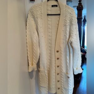 Cable knit sweater dress with pearl details and gold buttons